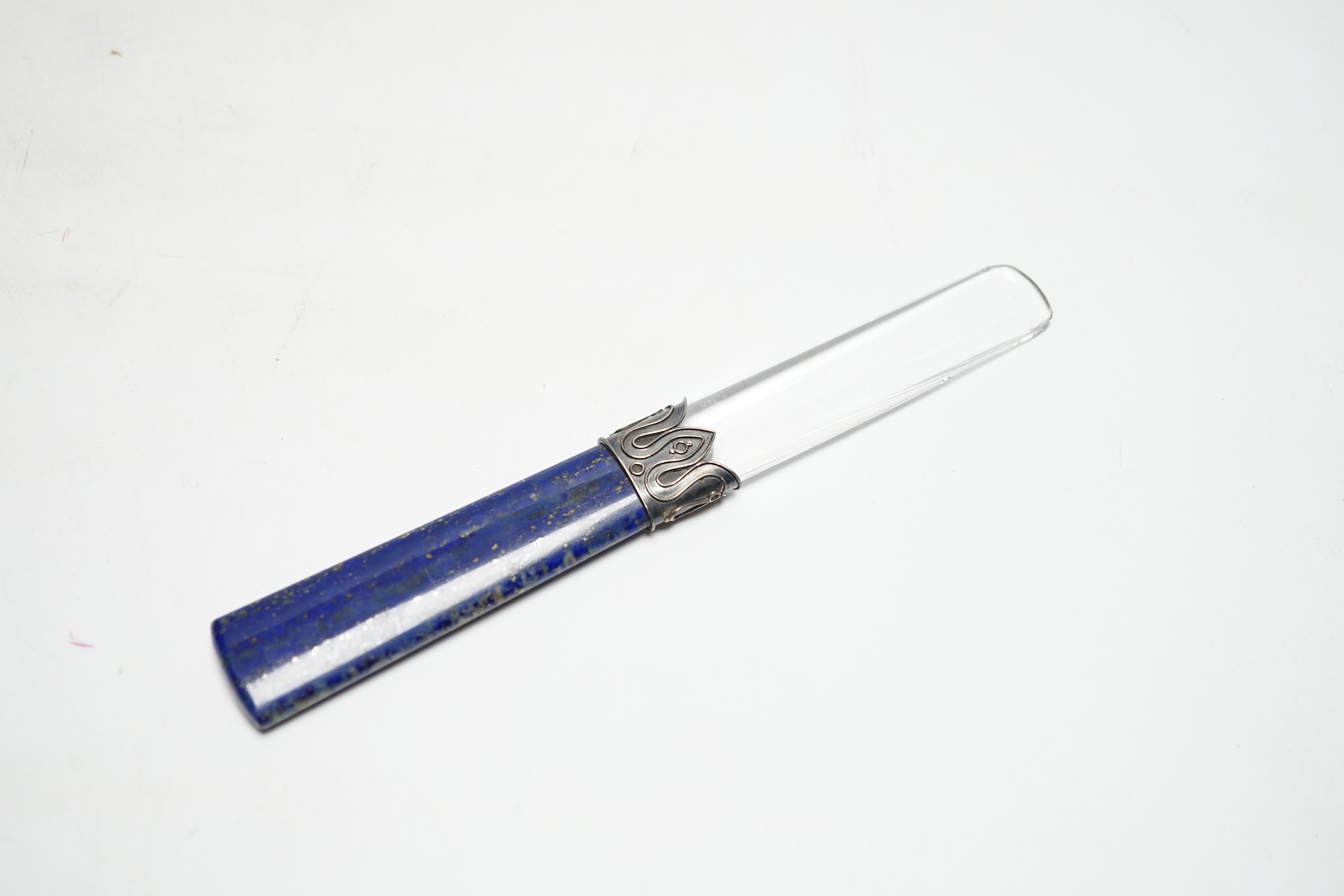 A lapis lazuli handled rock crystal paper knife, 17.9cm.